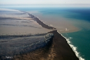 Oblique aerial photo of Skeidararsandur barrier spit coastline