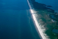 Caminada Headland from the air; view west.