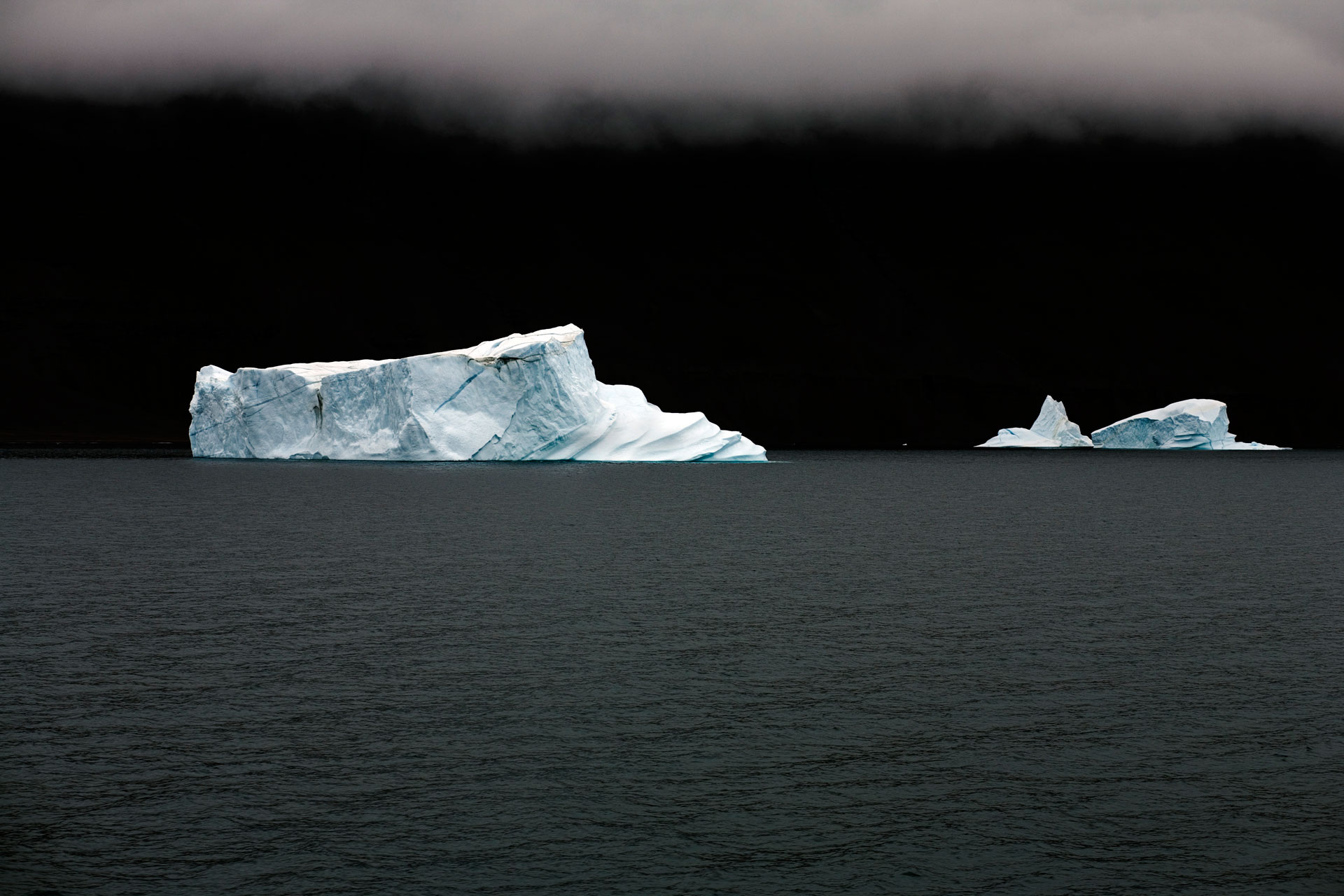 Icebergs Floating By – East Greenland / The Last Iceberg Series III; By Camille Seaman