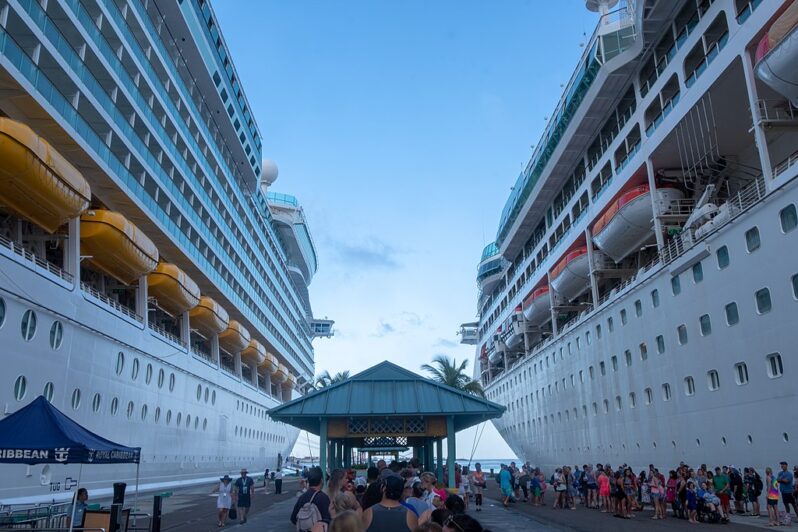 Exteriors of the Enchantment of the Seas and Mariner of the Seas in June 2018 (by Gregory Varnum, CC BY-SA 4.0, via Wikimedia Commons).