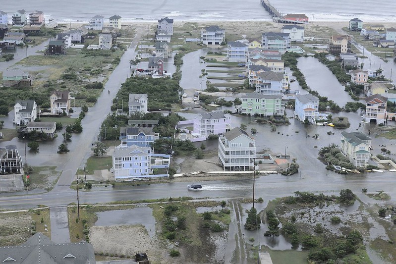 Flooding caused by Hurricane Arthur on the Outer Banks of North Carolina, July 4, 2014 (by Petty Officer 3rd Class David Weydert CC BY-NC-ND 2.0via Flickr).