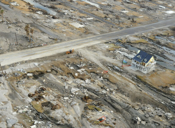 An aerial view of the damage Hurricane Ike inflicted upon Gilchrist, Texas (by Jocelyn Augusitno/FEMA, Public domain, via Wikimedia Commons).