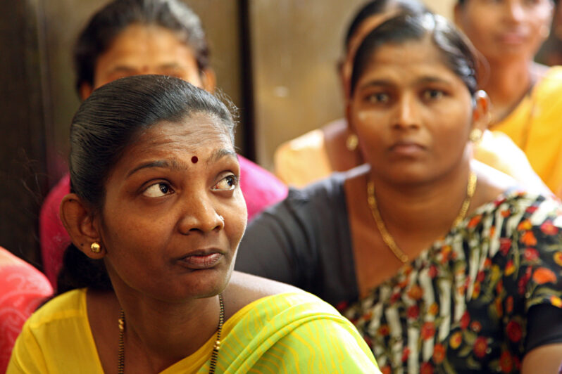 Women in a community meeting, Mumbai, India (by Simone D. McCourtie, World Bank Photo Collection CC BY-NC-ND 2.0 via Flickr).