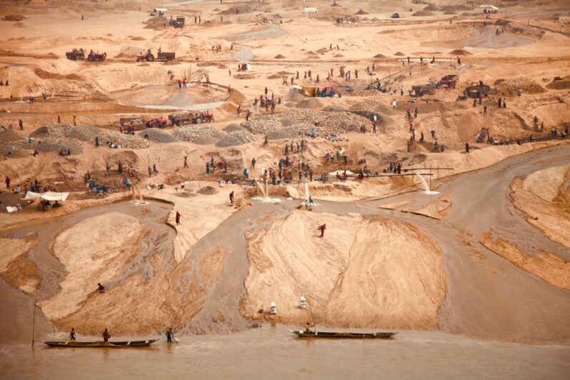 Sand Mining in Quarry Lake, Tahirpur, Bangladesh (by Hasin Hayder on unsplash).
