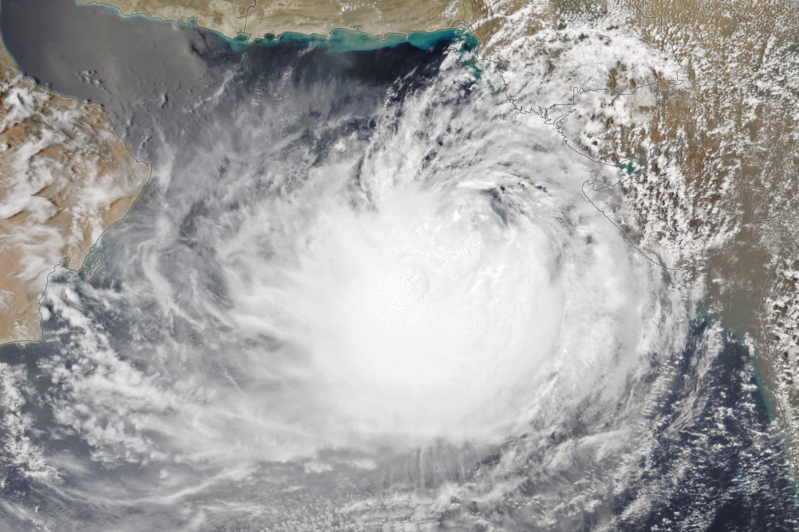 The long-lived cyclone, Biparjoy is expected to make landfall near the border of India and Pakistan (courtesy of NASA Earth Observatory image by Lauren Dauphin, using VIIRS data from NASA EOSDIS LANCE, GIBS/Worldview, and the Joint Polar Satellite System (JPSS).