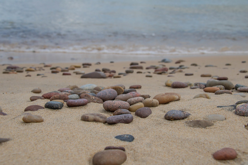 Pebbles on the Beach (by Susanne Nilsson CC BY-SA 2.0 via Flickr).