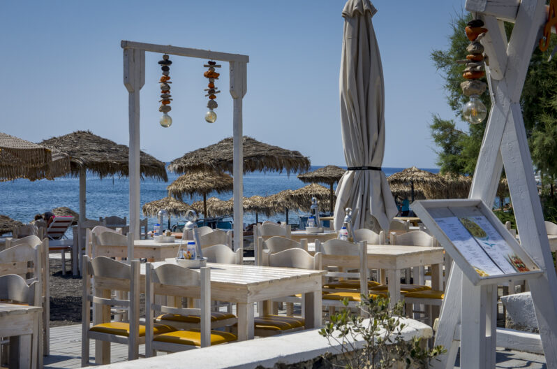 Restaurants take over the coast in Santorini, Greece © 2023 Deepika Shrestha Ross