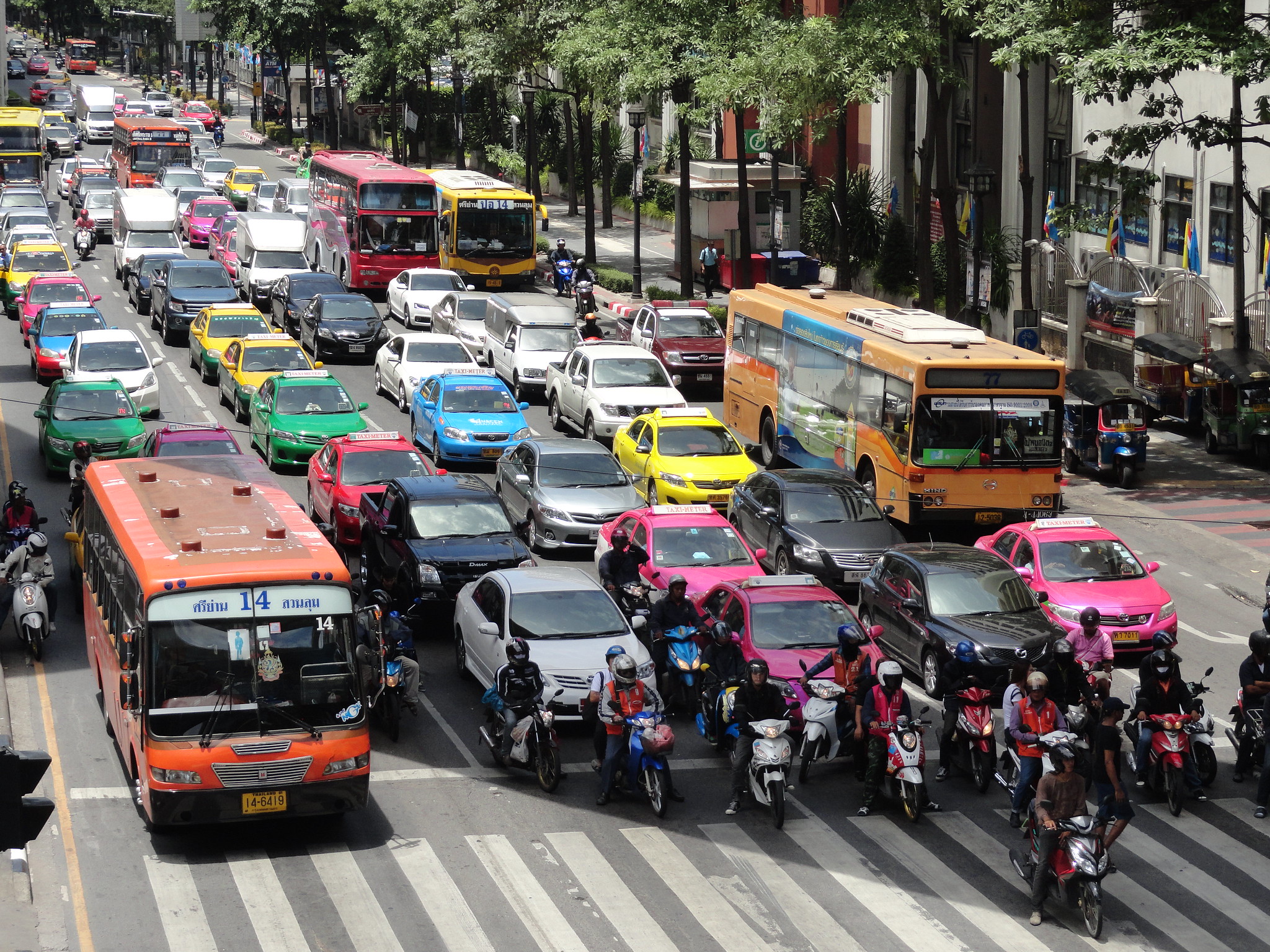 Bangkok's Traffic! Traffic at the corner of Ratchadamri and Rama I Road in Siam District of Bangkok, August 21, 2012 (by Fabio Achilli CC BY 2.0 DEED via Flickr).
