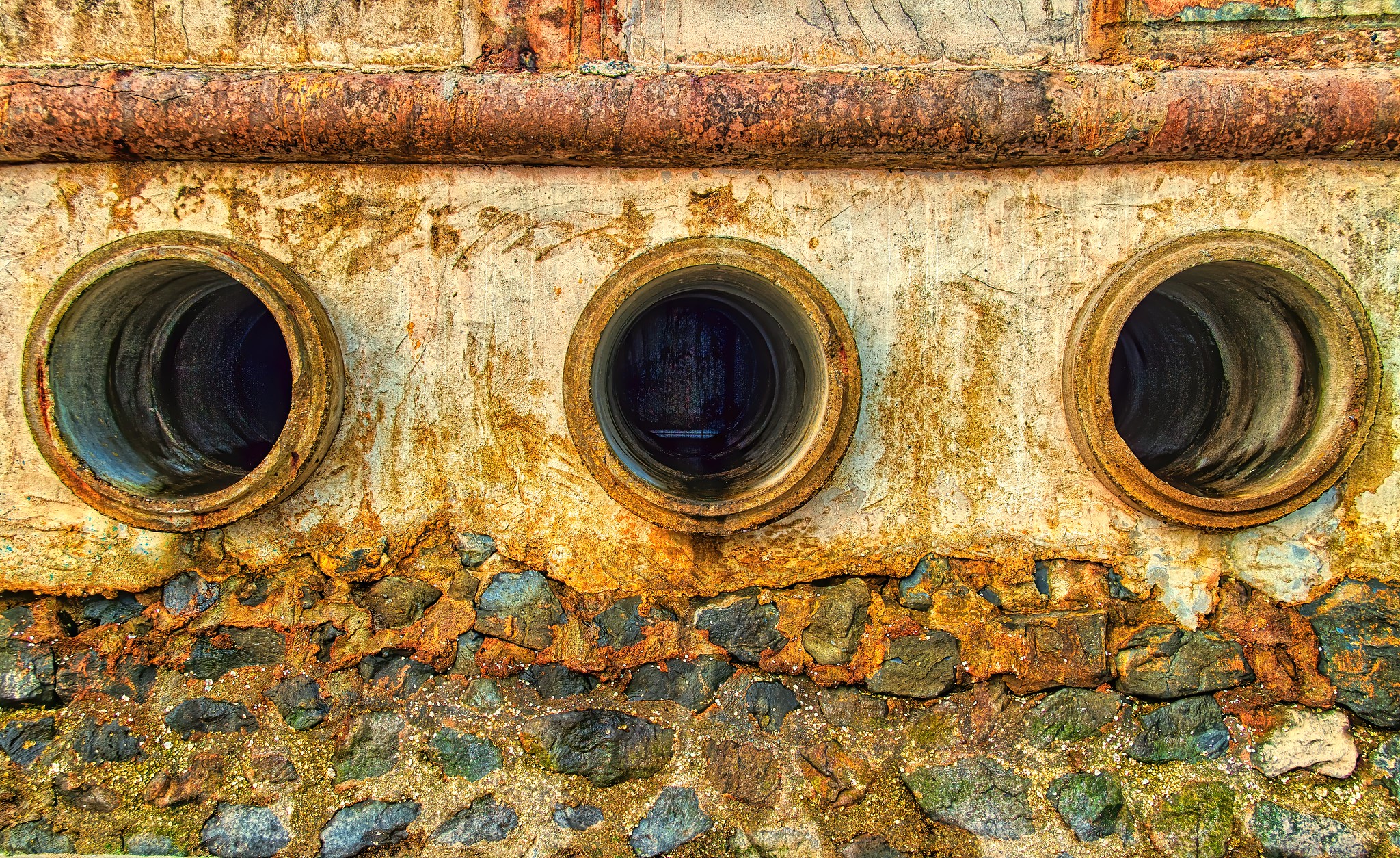 Sea wall drains, Prachuap Bay, Prachuap Khiri Khan, Thailand (by Troup Dresser CC BY-NC 2.0 DEED via Flickr).