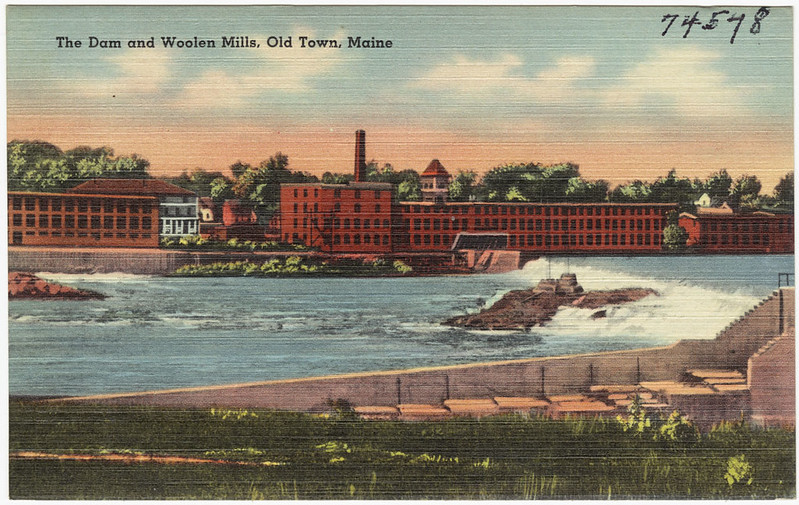Postcard of the dam and Woolen Mills, Old Town, Maine c. 1040 (courtesy of Boston Public Library CC BY 2.0 DEED via Flickr).
