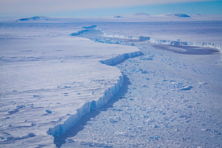 A close-up view of the rift separating Pine Island Glacier and iceberg B-46, as seen on an Operation IceBridge flight on November 7, 2018 (Courtesy of NASA | Brooke Medley CC BY 2.0 DEED via Flickr).