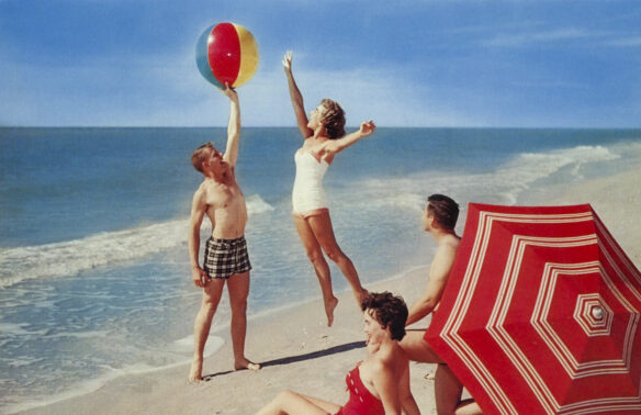Vintage postcard depicting Summer fun on the beach (uploaded by dan.marv CC BY 2.0 via Flickr).