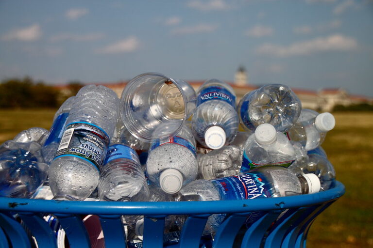 Recycling bin overflowing with water bottles on an unseasonably warm late-September day, on the National Mall in Washington, DC (by Mr.TinMD CC BY-ND 2.0 via Flickr).