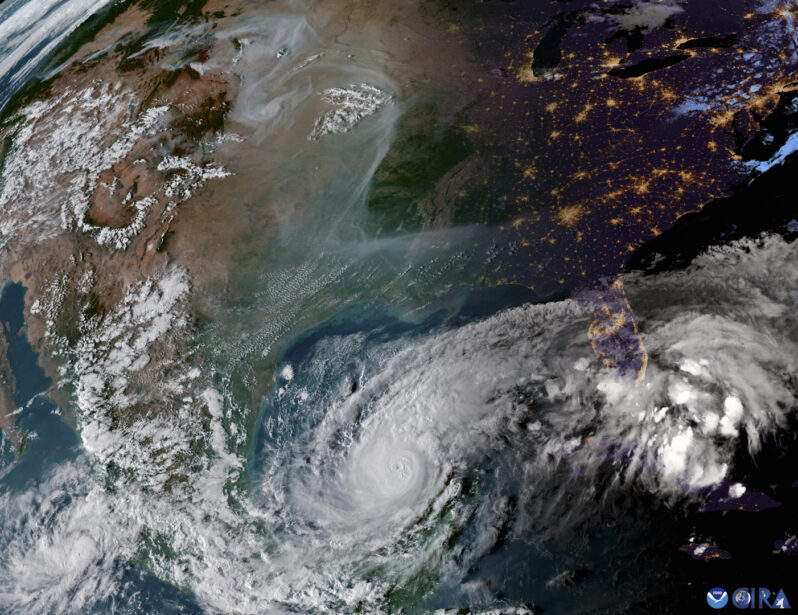 Category 5 hurricane Milton churns in the Gulf of Mexico as wildfires rage in the West at 10:30pm on October 7, 2024 (GeoColor imagery from the GOES-16 weather satellite courtesy of the Cooperative Institute for Research in the Atmosphere at Colorado State University and the National Oceanic and Atmospheric Administration).