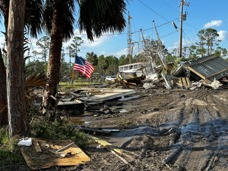 U.S. Airmen assigned to the 202nd Rapid Engineer Deployable Heavy Operational Repair Squadron Engineers (RED HORSE) Squadron, Florida Air National Guard, clear roads in Keaton Beach, Florida, after the landfall of Hurricane Helene, Sept. 27, 2024 (Courtesy of The National Guard, photo by Staff Sgt. Jacob Hancock CC BY 2.0 via Flickr).