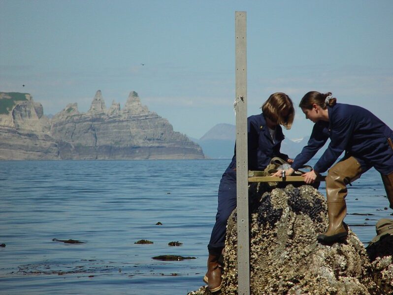 Installing a tide gage near Castle Cape (courtesy of NOAA Photo Library CC BY 2.0 via Flickr).