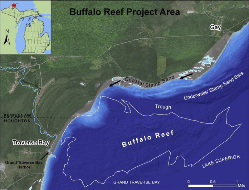 Figure 19. Michigan Department of Environment, Great Lakes, and Energy (EGLE) map of the Buffalo Reef project area. The stamp sand deposits continue to have significant negative offshore impacts as well as the original beach destruction. Buffalo Reef, an approximately 2,200-acre spawning ground for whitefish and lake trout that has supported an important fishing industry as well as supporting a diverse invertebrate fauna, is being buried by stamp sands, particularly fines, carried offshore. The subaerial Gay beach is highlighted along with arrows indicating dominant longshore transport directions. Note there are significant volumes of stamp sands offshore (sand bars and fill in trough). Note too, the apparent terminus at the river mouth jetties at Grand Traverse Bay Harbor.