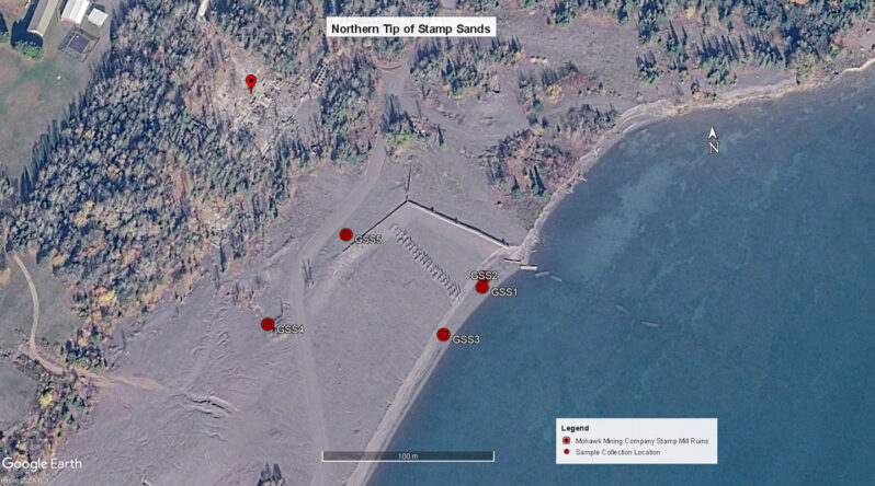 Figure 3. Stamp sands sample collection locations at the Gay former mills site. GSS1 and 2 were from the beach area for composition and grain size/sorting analysis. GSS3 and GSS4 from areas subject to wind-blown size-sorting and composition (e.g., GSS4 from wind deposit in wind-shadow of fallen log). GSS5 is from the coarser sediment clasts found in the back beach area, commonly used currently for off-road vehicle recreation (ATV’s, motorbikes, etc.). This image also provides a good perspective on the submerged concrete sections of the sluice flume that have fallen into the lake as erosion removed the supporting base of accumulated stamp sands. The line of exhumed support posts marks the former path of one of the conveyor systems.